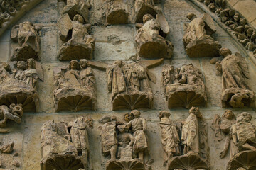 View of the exterior facade of the Roman Catholic Notre Dame de Reims Cathedral, a historical...