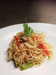 Asian style stir fried rice noodles with vegetables