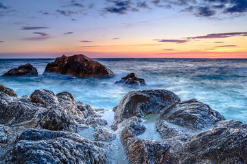 Fototapeta na wymiar Sunrise over the sea (Mediterranean Sea, Costa Brava, Catalonia, Spain)