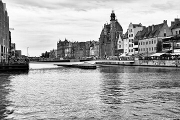 Fototapeta premium Bridge on the canal. Artistic look in black and white.
