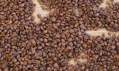 Roasted coffee beans on burlap
