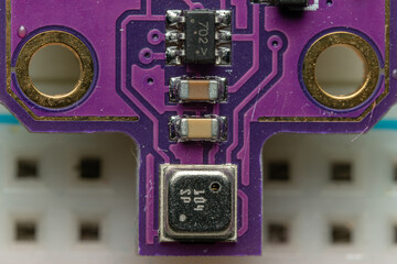 Macro Photo of a Purple PCB Module for the BME680 MEMS Environmental Sensor. 
