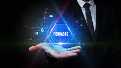 Man hand holding PODCASTS inscription, social media concept