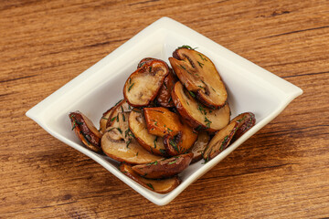 Roasted champignon with herbs and spices