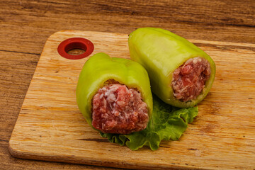 Raw stuffed bell pepper with meat