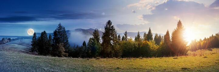 day and night time change concept of foggy autumn panorama. spruce trees on the meadow beneath a sun and moon. mountain behind the mist. cloud inversion natural phenomenon observed from the side - obrazy, fototapety, plakaty