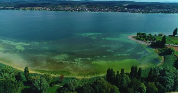 Aerial view of the island Reichenau on the Bodensee on a cloudy morning in summer.