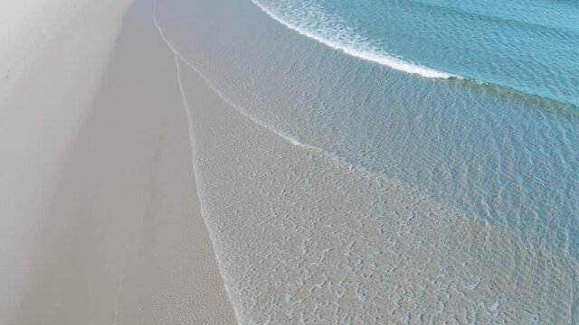 Sunny Day East Ballina NSW Richmond River Mouth Aerial Drone Footage with Small Waves and Crystal Clear Water Boats Background Blue Sky Sunday Morning Shaws Bay White Sand Small Town Bridge Beach