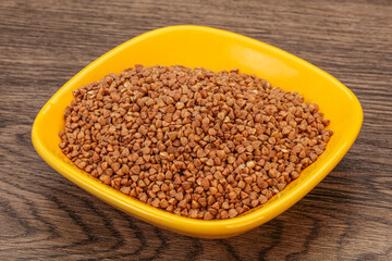 Raw buсkwheat cereal in the bowl