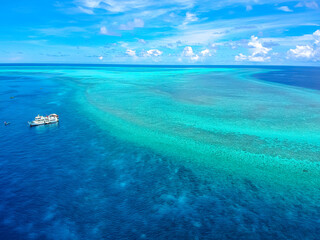 Atoll with blue sky on tubbataha reef