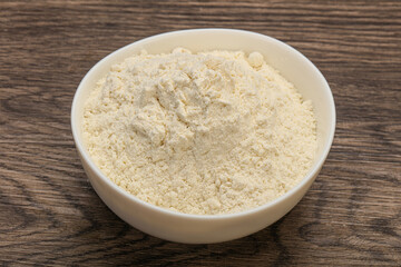 Wheat flour heap in the bowl