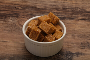 Cane sugar cubs in the bowl