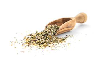 Herbal tea or dry herb in wooden scoop