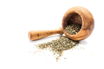 Herbal tea or dry herb in mortar and pestle