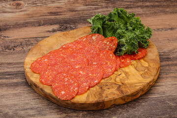 Italian spycy pepperoni sausage slices