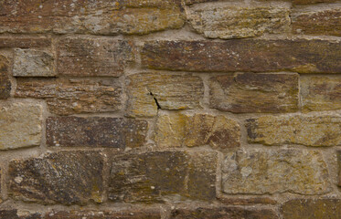Background or Texture of a Brown Granite Stone Wall