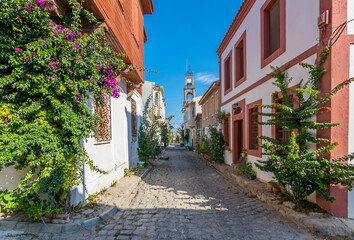 Fototapeta na wymiar Bozcaada streets view. Bozcaada is populer tourist attraction in Aegean Sea.