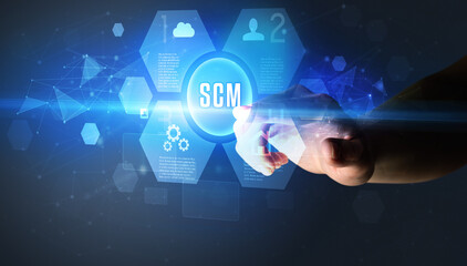 Hand touching SCM inscription, new technology concept