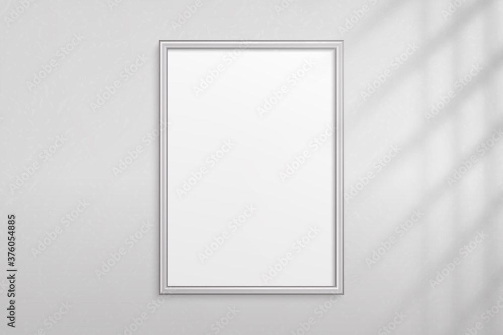 Poster mockup silver frame photo on wall. mock up picture framed. vertical modern boarder with shadow. empt