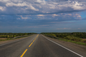 Empty highway crossing the horizon