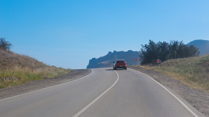 Car Moves along a winding road