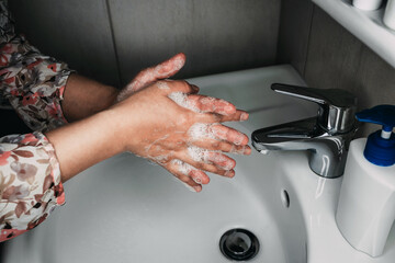 washing hands with soap