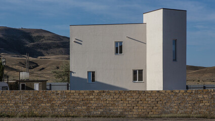 Two-storey residential building in the background