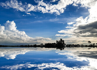 The village environment of India during sunset, the reflection of white clouds in the blue sky and the beautiful environment.