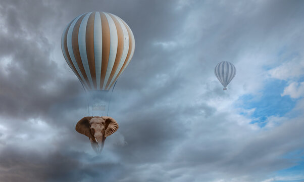 Elephant Flying With Hot air Balloon, amazing cloudy sky in the background