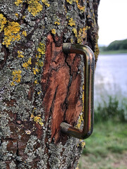 rusty metal handle on a pillar