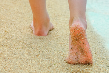 beautiful footprints in the sand by the sea background