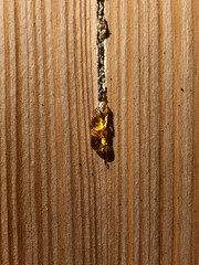 golden resin on a wooden background