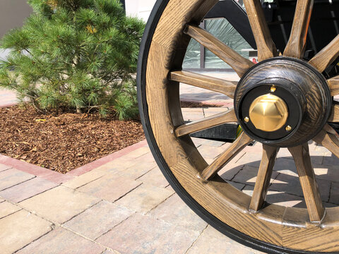 old wheel of a wooden cart
