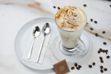 cup of cappuccino with chocolate