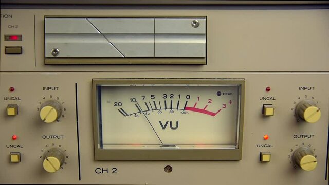 An analog VU meter from a vintage reel to reel tape recorder