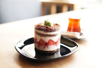 dessert with whipped cream and strawberries