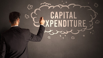 businessman drawing a cloud with CAPITAL EXPENDITURE inscription inside, modern business concept