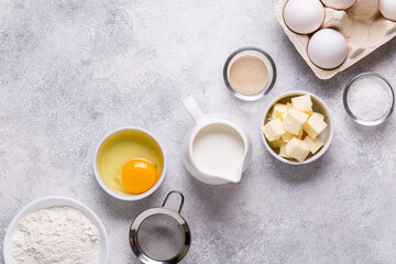 Obraz na płótnie Canvas Ingredients for baking - flour, milk, salt, sugar, eggs.