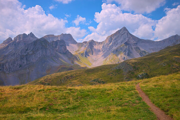 Fototapeta na wymiar Path through the mountains of the Pyrenees of Huesca. Natural Park of the Western Valleys. Aragon