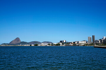 Fototapeta premium Cityscape of Rio with Sugar Loaf at the background