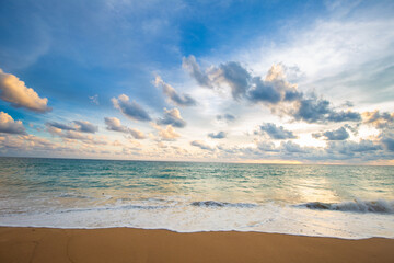 Sea wave on white snad beach close up