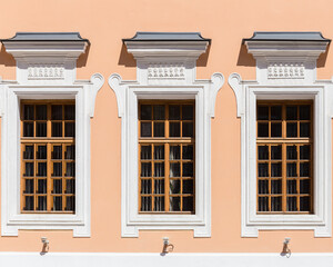 The facade of the building with three Windows.