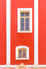 Fototapeta na wymiar Two Windows on the facade of the building.