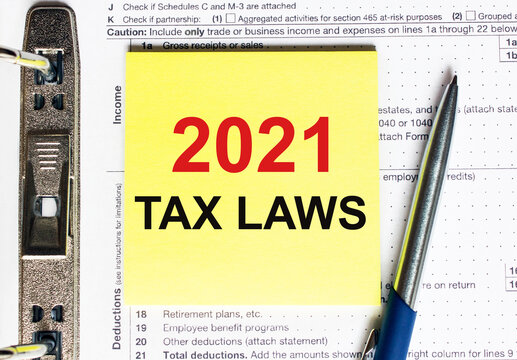 Yellow Paper With Text 2021 Tax Laws