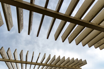 wooden planks on a background of sky and clouds