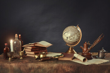 Desktop of a scientist, writer, or student of past centuries. Vintage items, books and manuscripts...