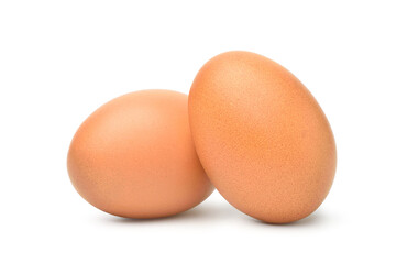 Two chicken eggs isolated on white background. Clipping path.
