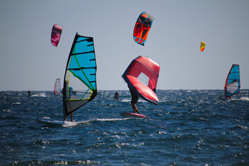 Watersports windsurfing, wingfoiling and kiteboarding at the Atlantic Ocean (Tenerife, Spain)