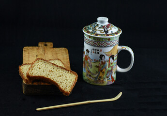 cup of Chinese tea with slices of bread