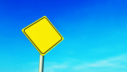 Mockup of a yellow diamond-shaped road sign on a metal pole, against a blue sky